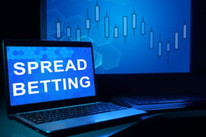A computer displays a spread bet