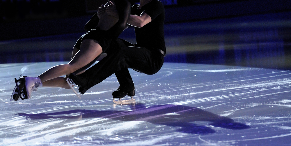 Ice dancing pair with shadow