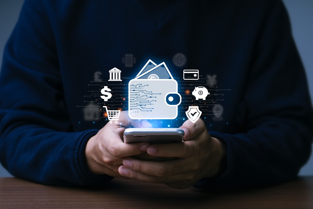 A man uses a digital wallet on a mobile device